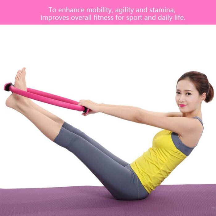 Woman exercising with a fitness resistance band.