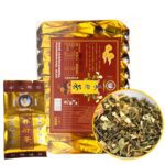 Chinese herbal tea packaging and loose tea leaves